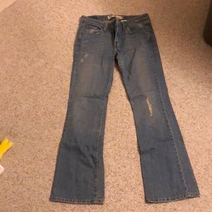 Medium wash bootcut Levi’s jeans
